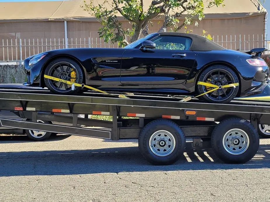 open trailer transport black amg benz