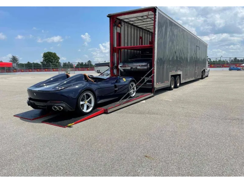 enclosed carrier trailer home deliver exotic race car